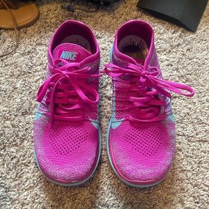Pink Nike free sneakers